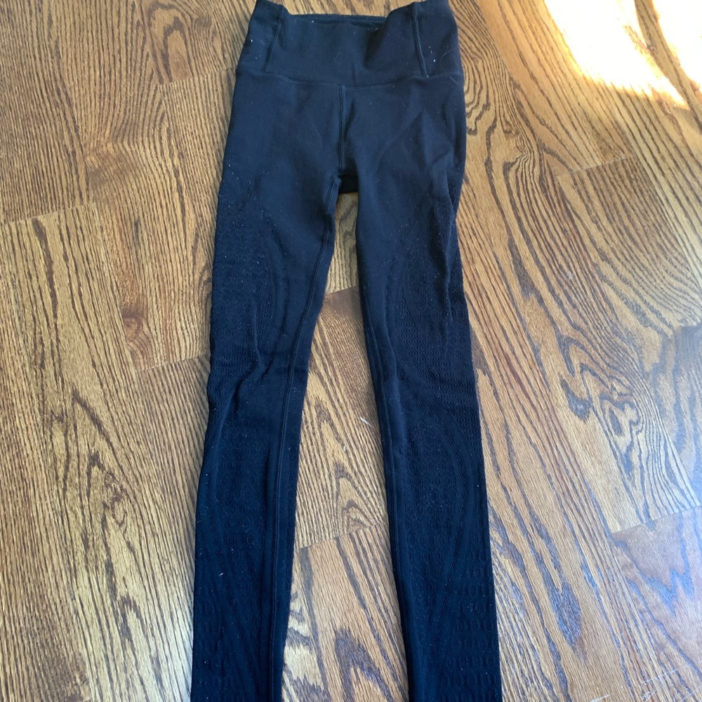 lululemon black leggings with hole designs